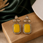 Aarini Yellow Kundan Stud Earrings